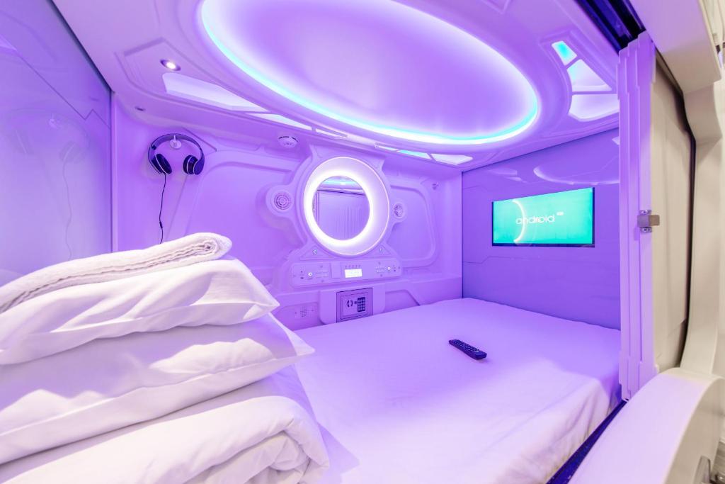 Postel nebo postele na pokoji v ubytování Capsule Hostels Tallinn