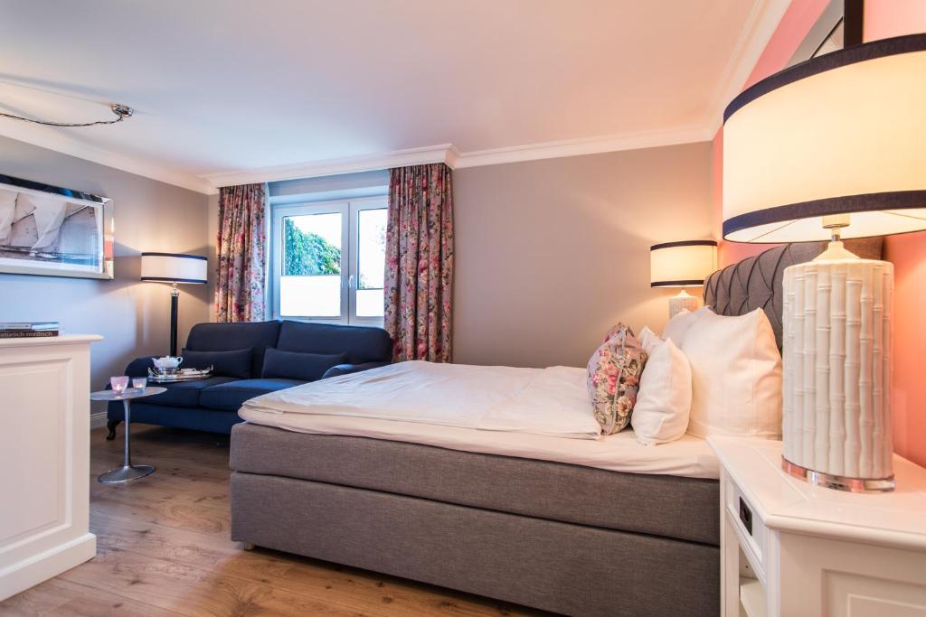 Postel nebo postele na pokoji v ubytování Hotel Norderriff