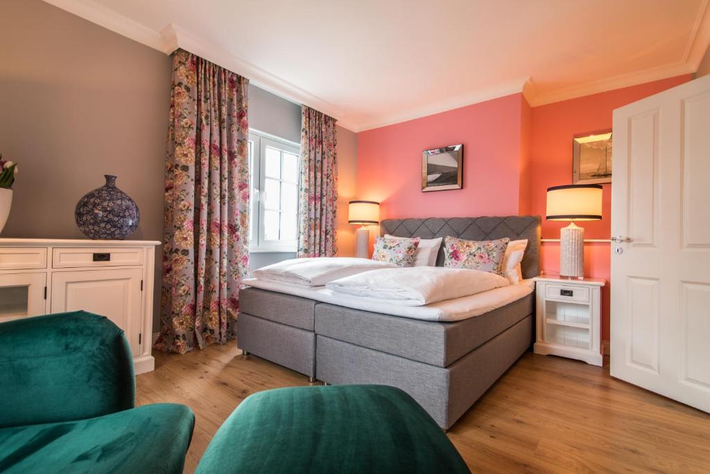 Postel nebo postele na pokoji v ubytování Hotel Norderriff