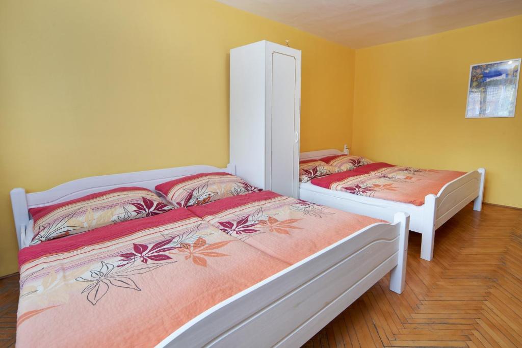 Postel nebo postele na pokoji v ubytování Penzion Zajíček