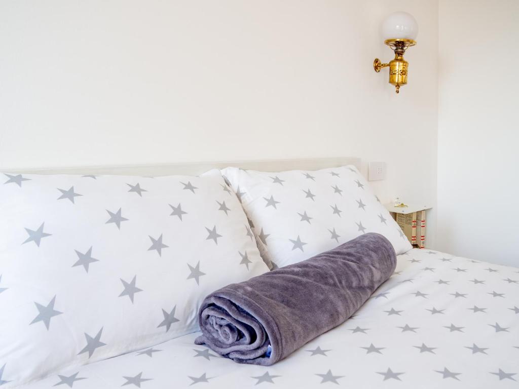 Posteľ alebo postele v izbe v ubytovaní B&B marnaecalcare