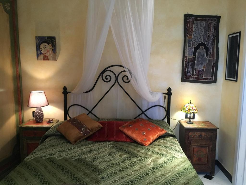 Ένα ή περισσότερα κρεβάτια σε δωμάτιο στο Romantic Sea View Flat in Genova