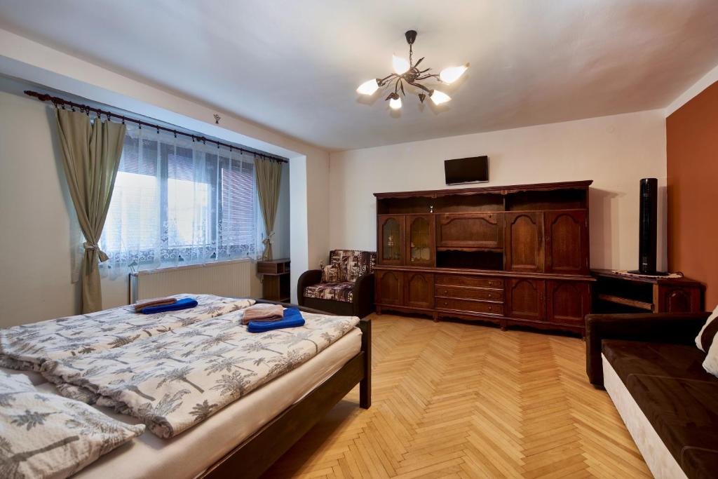 Postel nebo postele na pokoji v ubytování Penzion Zajíček