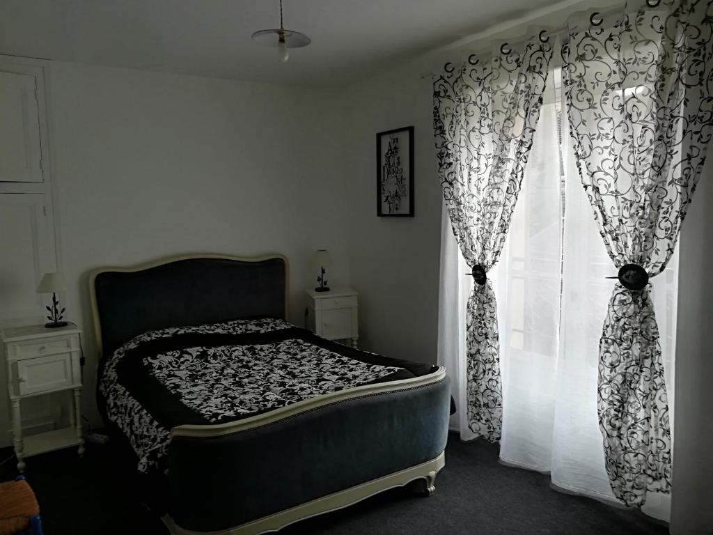 maison de vacances en Périgord noir tesisinde bir odada yatak veya yataklar