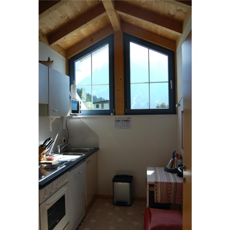 Kuchyň nebo kuchyňský kout v ubytování Panoramablick