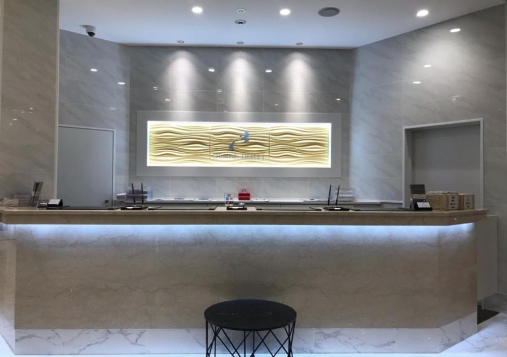 The lobby or reception area at Bande Hotel Tenpozan Higashi