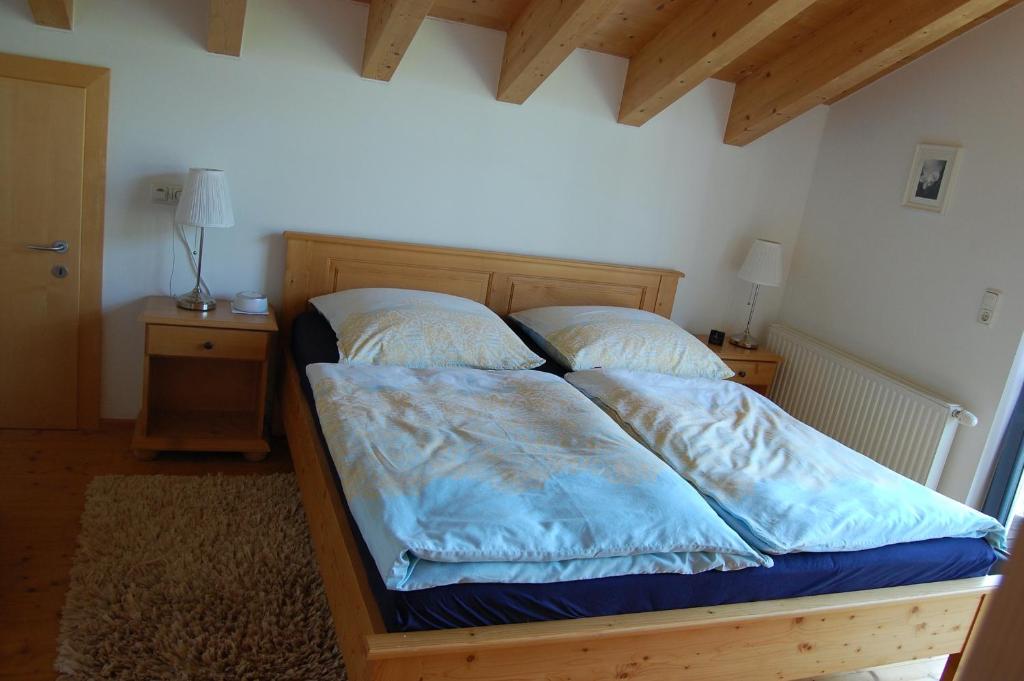 Postel nebo postele na pokoji v ubytování Panoramablick