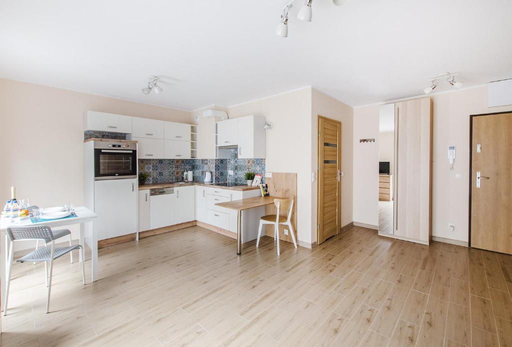 Kuchyňa alebo kuchynka v ubytovaní Smart Rental Management Apartments - CITY CENTER