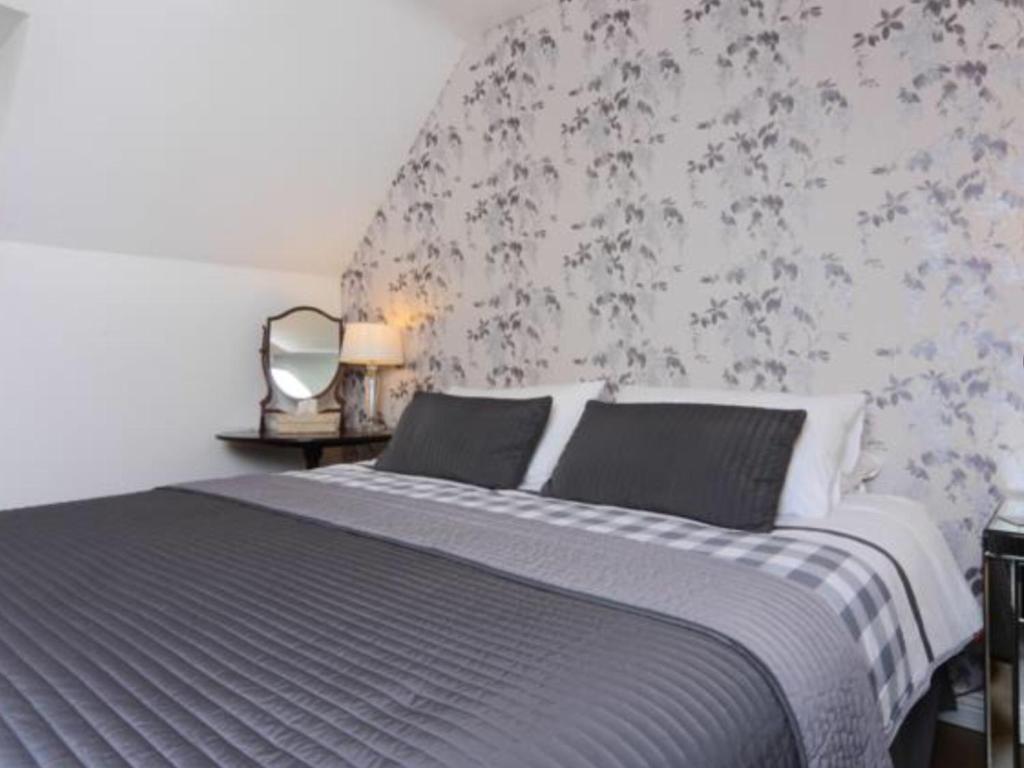 Postel nebo postele na pokoji v ubytování Harford en-suite Rooms