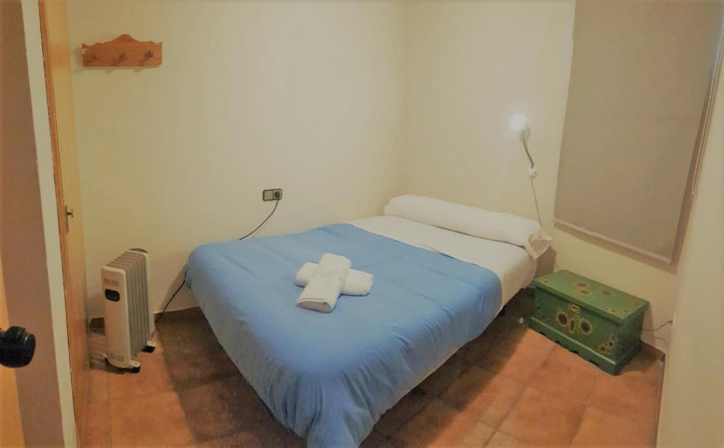 Cama o camas de una habitación en TODOSIERRANEVADA ZONA BAJA - MONTBLANC VISTAS A LA MONTANA - Junto a los Telecabinas
