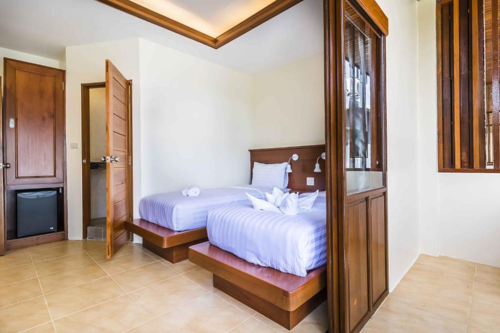 Postel nebo postele na pokoji v ubytování Wyh Hotels