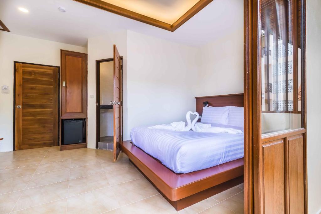Postel nebo postele na pokoji v ubytování Wyh Hotels