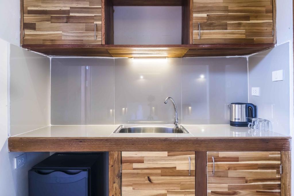 Kuchyň nebo kuchyňský kout v ubytování Wyh Hotels