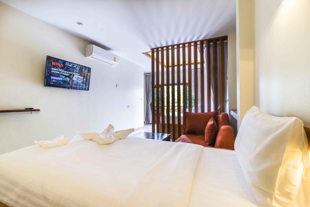 Postel nebo postele na pokoji v ubytování Wyh Hotels