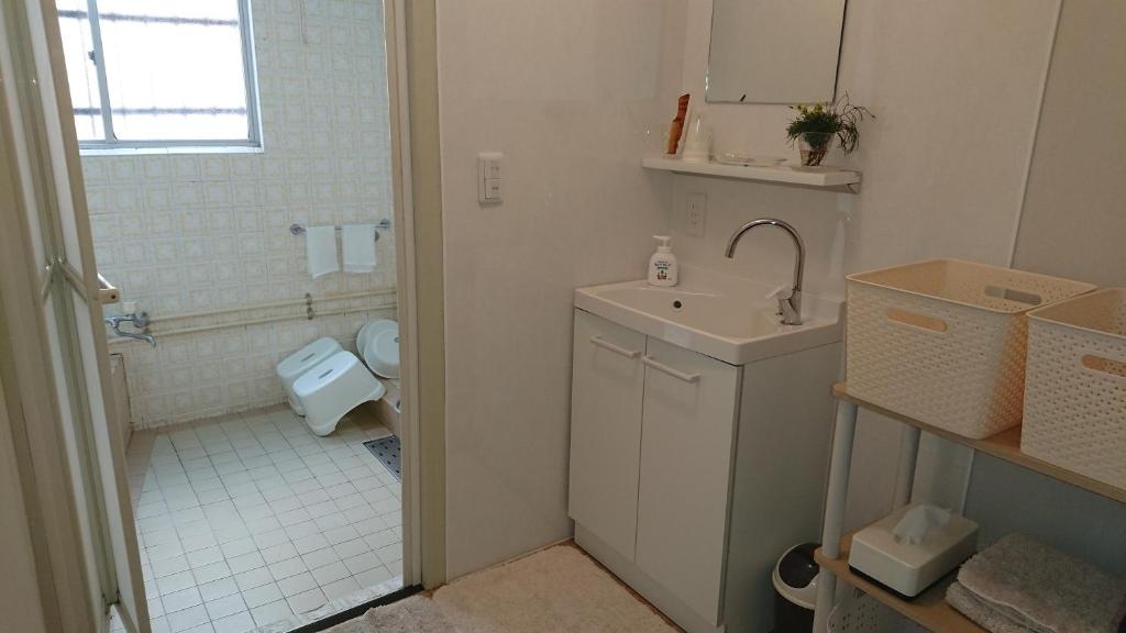 Koupelna v ubytování Kasuga Ryokan