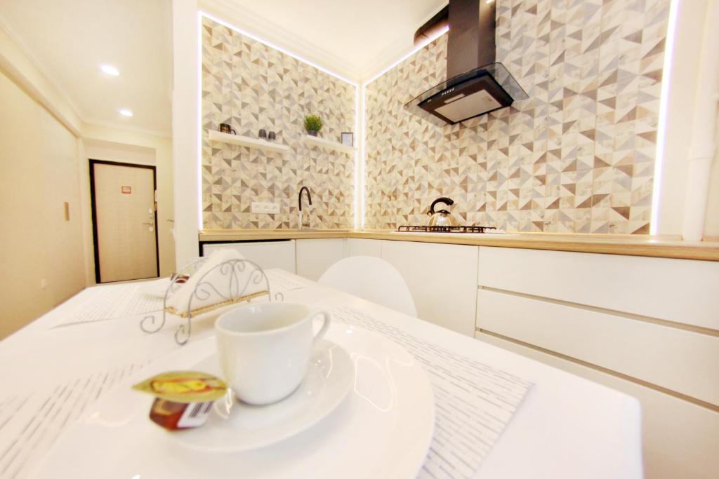Уютная однокомнатная квартира в историческом центре города - Appartement D'une Chambre