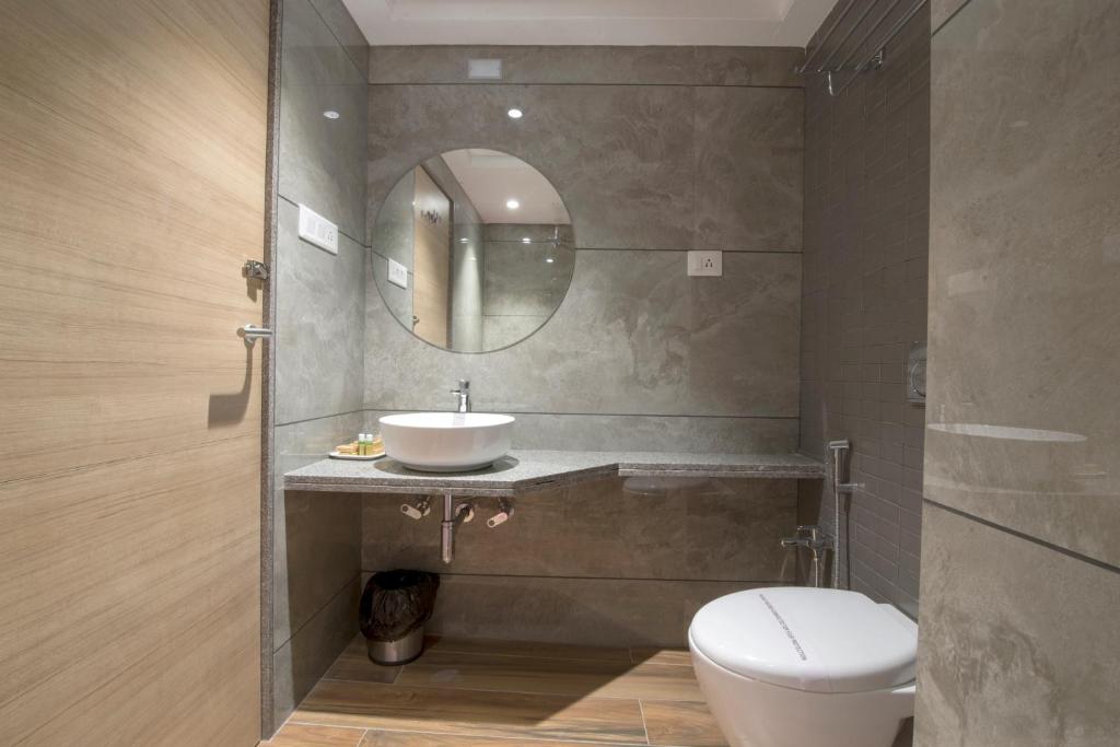 Koupelna v ubytování HOTEL SILVERA GRAND