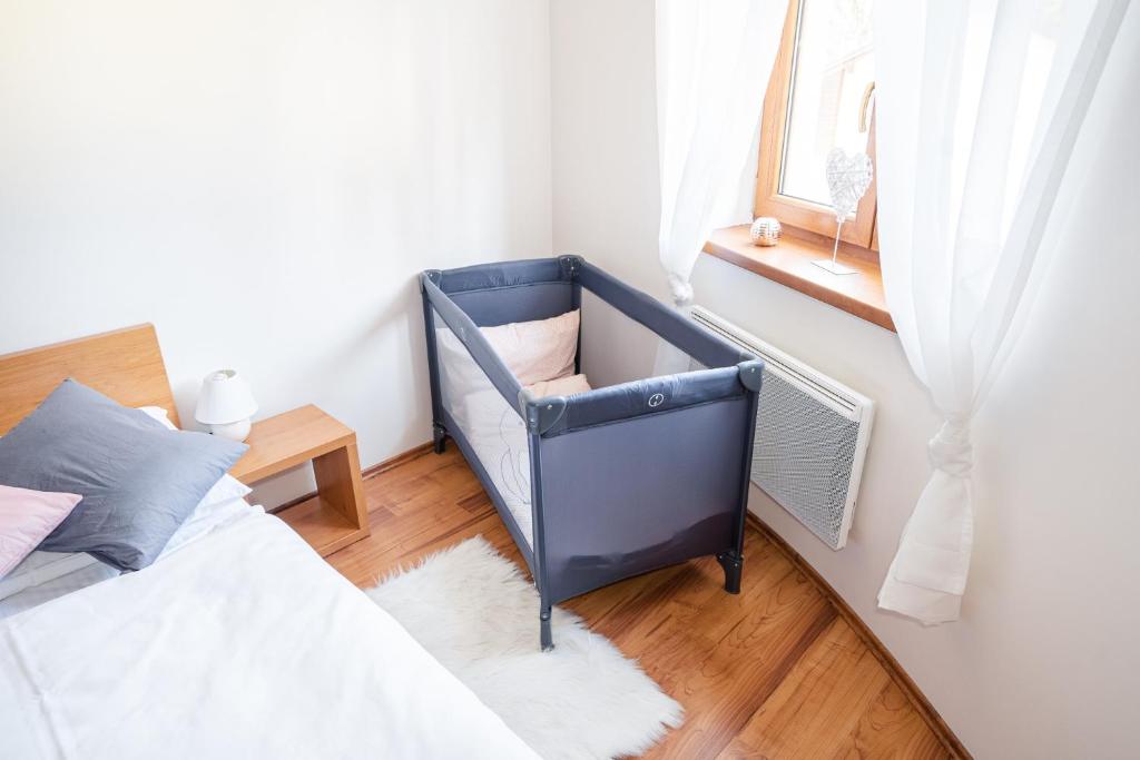 Postel nebo postele na pokoji v ubytování Apartmán HOREHRONIE