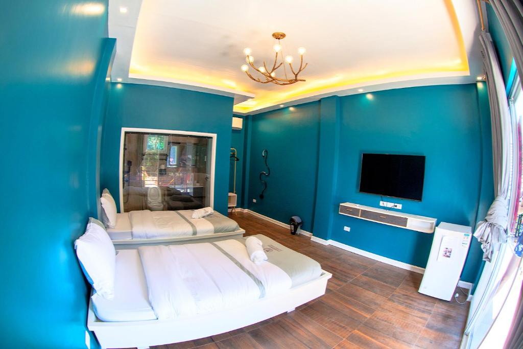 TV a/nebo společenská místnost v ubytování 71% Diving Resort