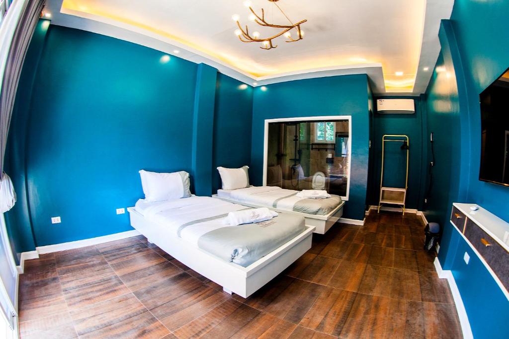 Postel nebo postele na pokoji v ubytování 71% Diving Resort
