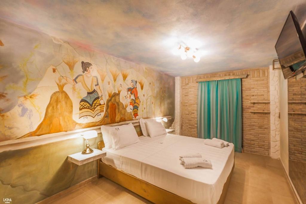TV a/nebo společenská místnost v ubytování Leda Suites