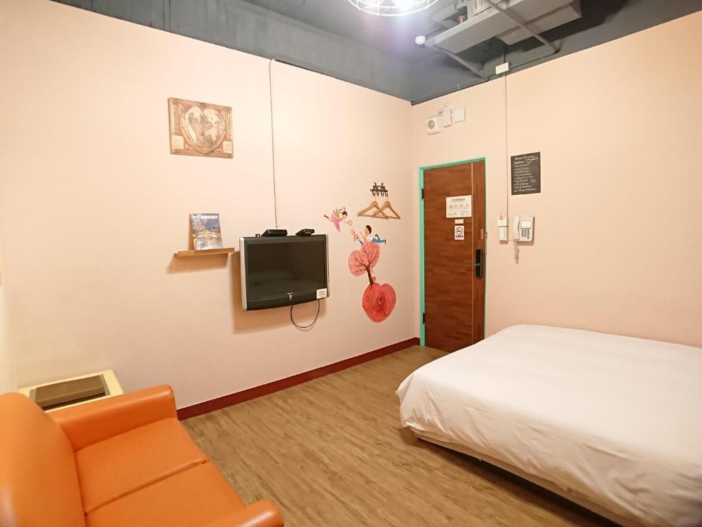 Postel nebo postele na pokoji v ubytování DongNing Atlas Hotel