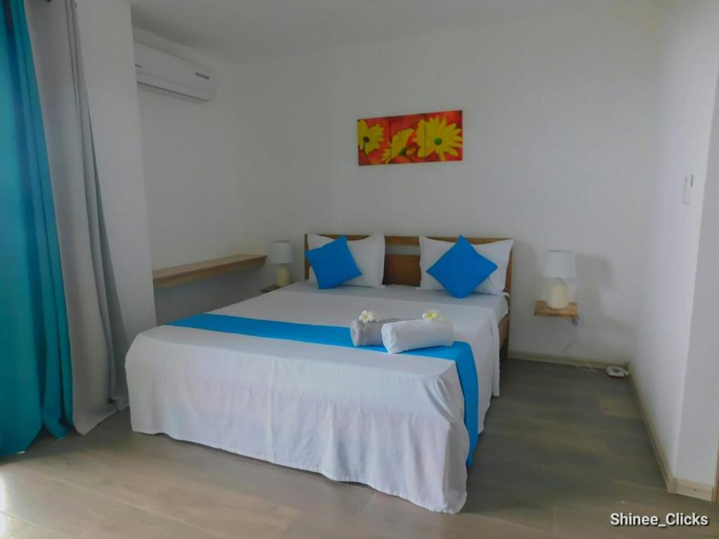 Postel nebo postele na pokoji v ubytování Fullmoon Apartment & Studio