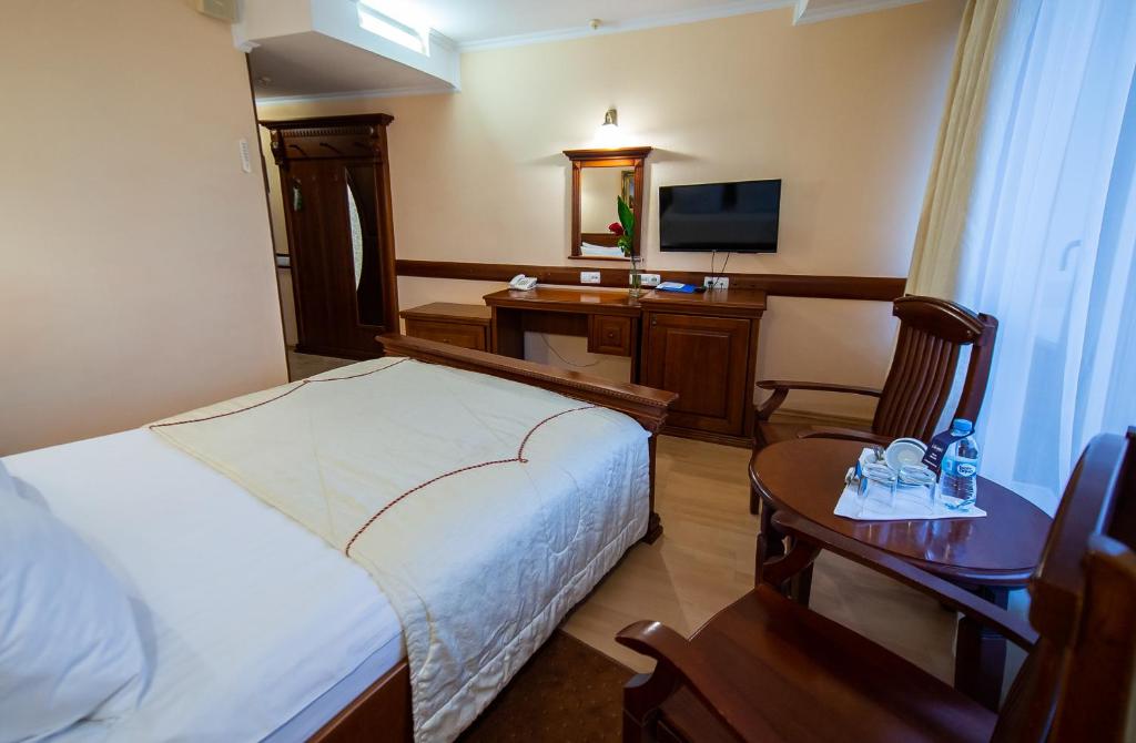 TV a/nebo společenská místnost v ubytování Salute Hotel