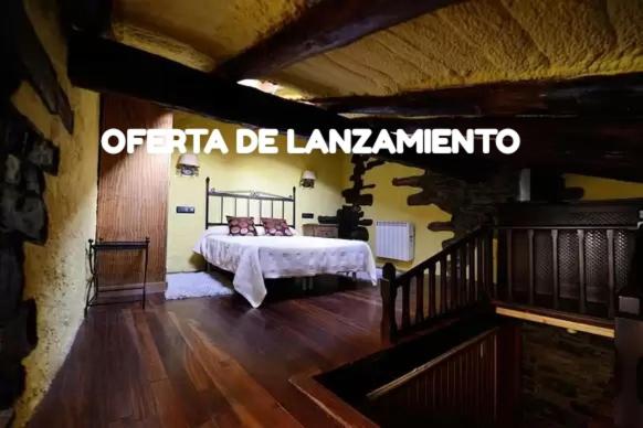 a bedroom with a bed in a room at CASA TENA in Biescas