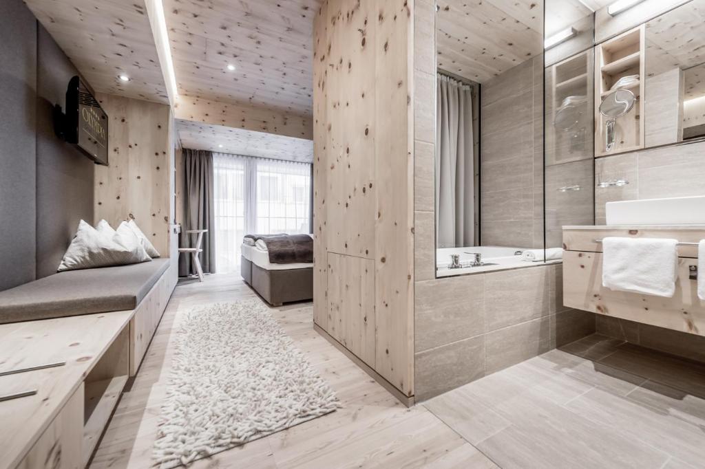 Postel nebo postele na pokoji v ubytování Hotel Olympia