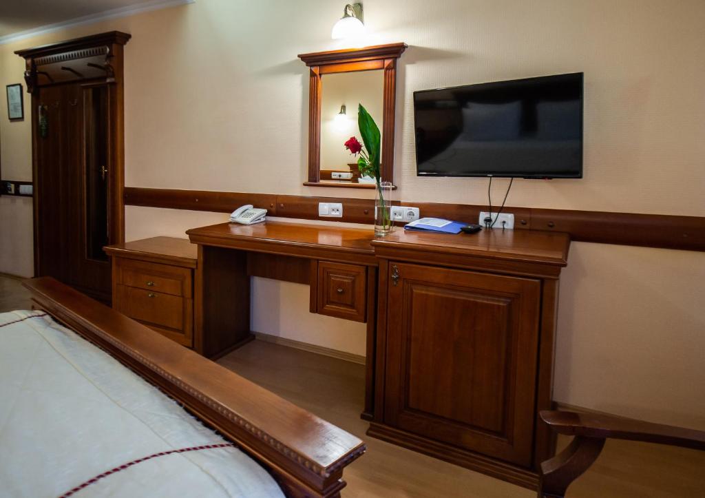 TV a/nebo společenská místnost v ubytování Salute Hotel