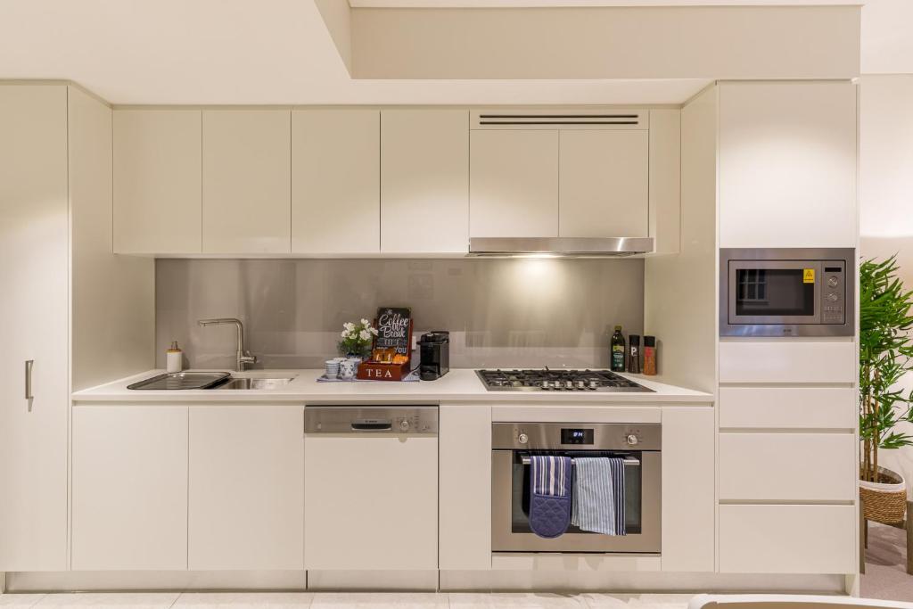 Cucina o angolo cottura di Hamptons Retreat on Level 77 Skytower
