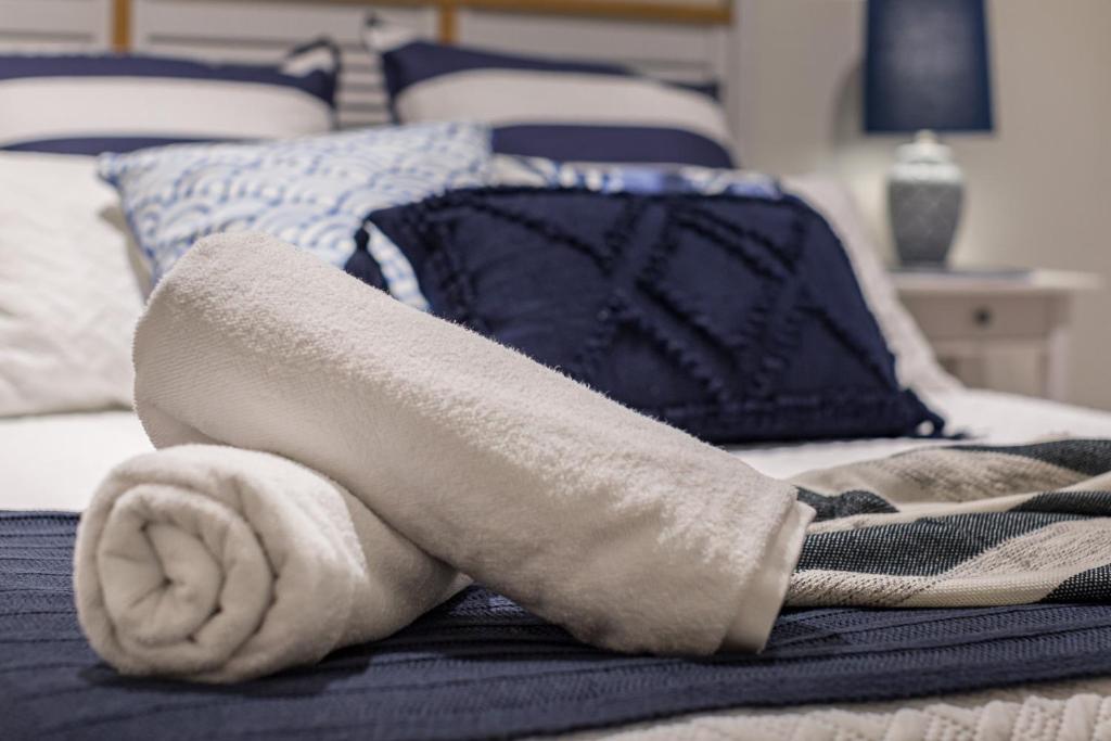 Letto o letti in una camera di Hamptons Retreat on Level 77 Skytower