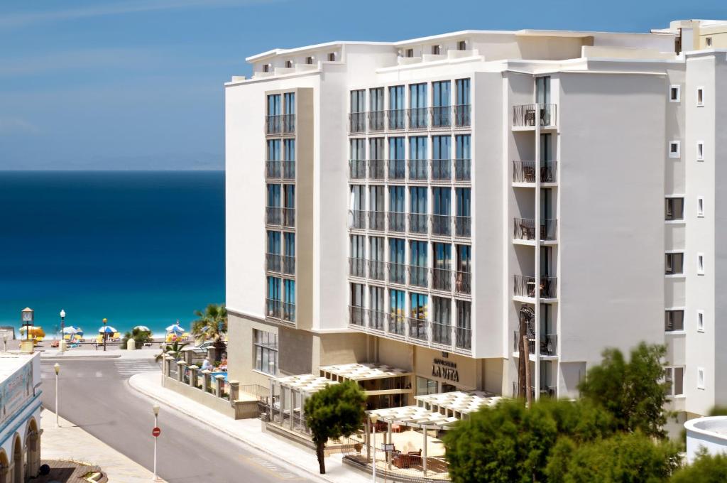 a rendering of a building with the ocean in the background at Mitsis La Vita in Rhodes Town