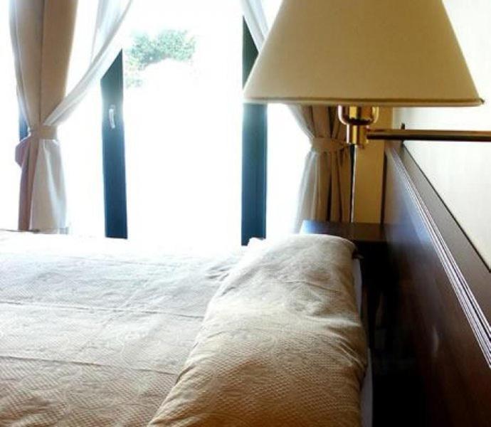Postel nebo postele na pokoji v ubytování Hotel Cuor Di Puglia