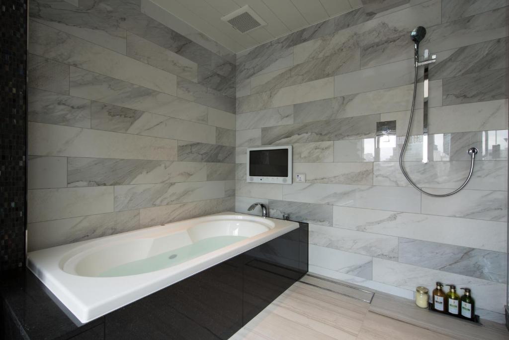 Koupelna v ubytování HOTEL GLANZ CASCATA