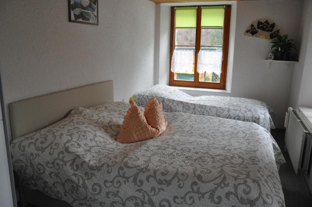 Postel nebo postele na pokoji v ubytování Ferienwohnungen Alter Raaben