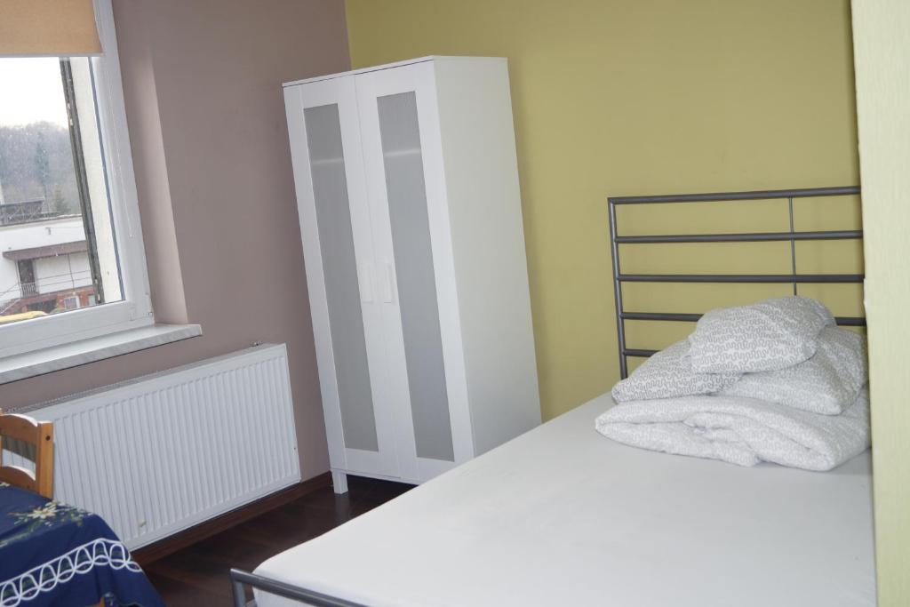 Postel nebo postele na pokoji v ubytování Noclegi u Matyldy