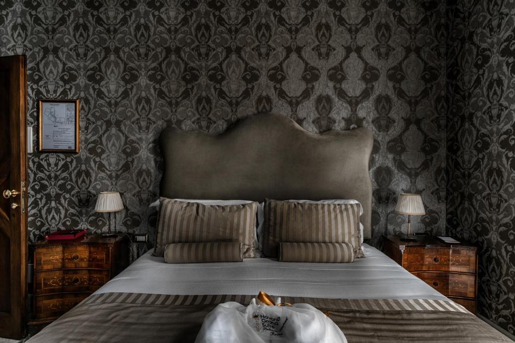 Posteľ alebo postele v izbe v ubytovaní Navona Grand Suite