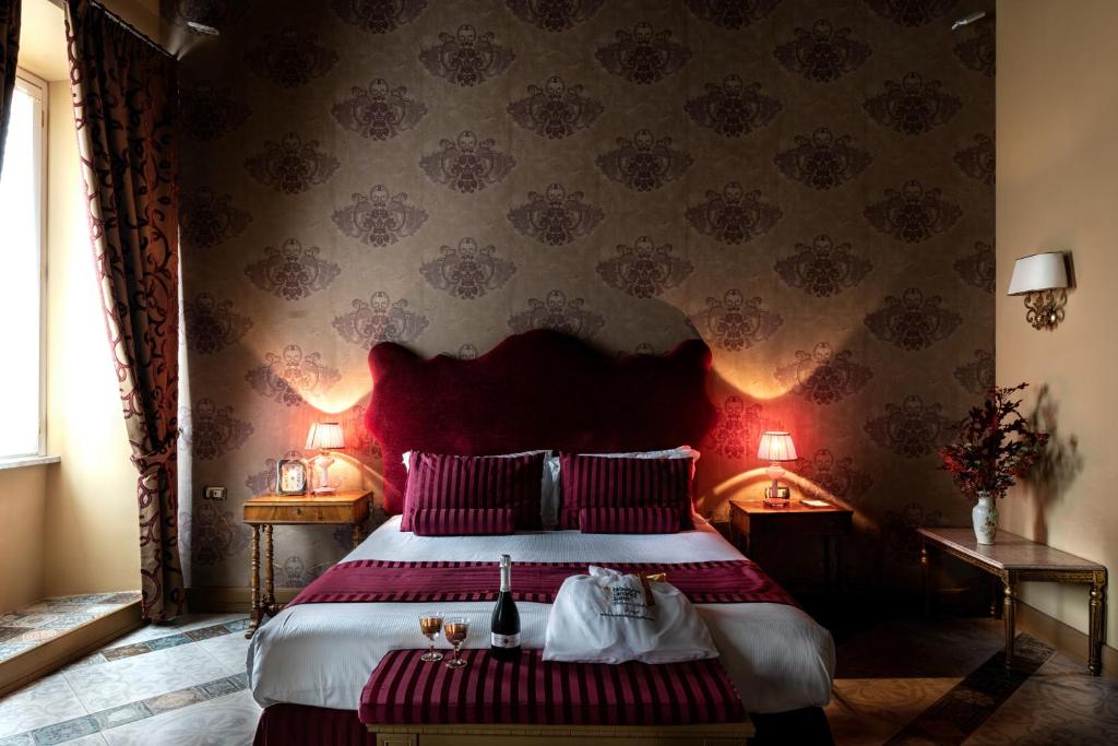 Posteľ alebo postele v izbe v ubytovaní Navona Grand Suite