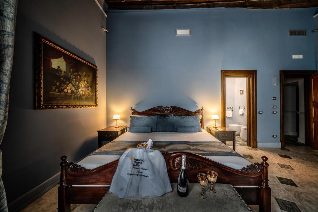 Posteľ alebo postele v izbe v ubytovaní Navona Grand Suite