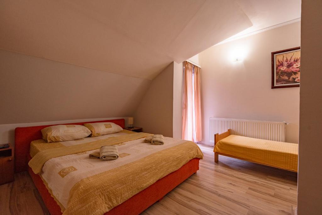 Postel nebo postele na pokoji v ubytování B&B Bebinac