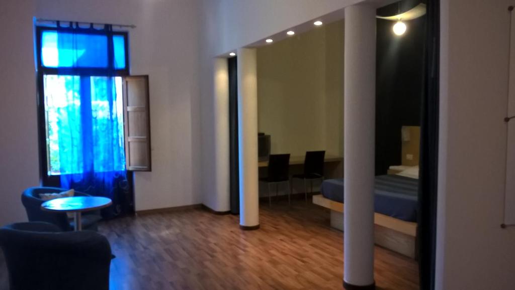 Postel nebo postele na pokoji v ubytování Bellaria Relais