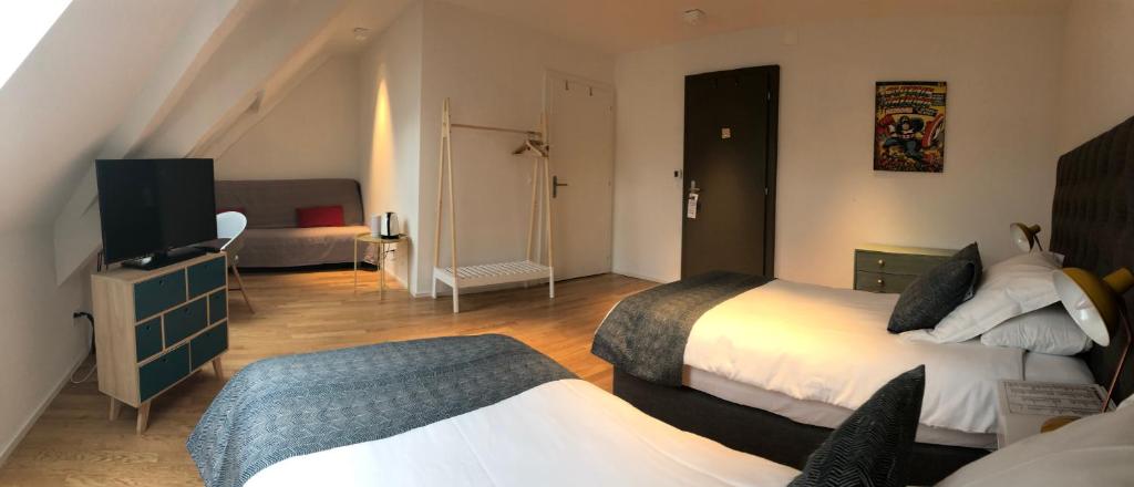 Postel nebo postele na pokoji v ubytování L’Auberge de Mézières