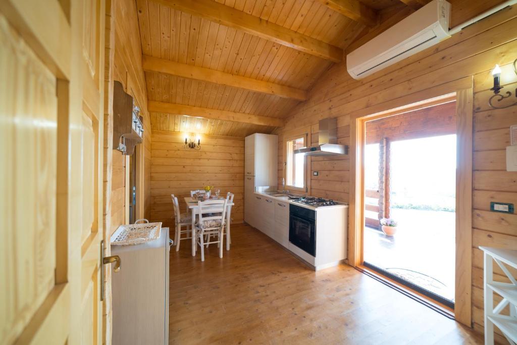 Kuchyň nebo kuchyňský kout v ubytování Chalet Tenuta Lacco