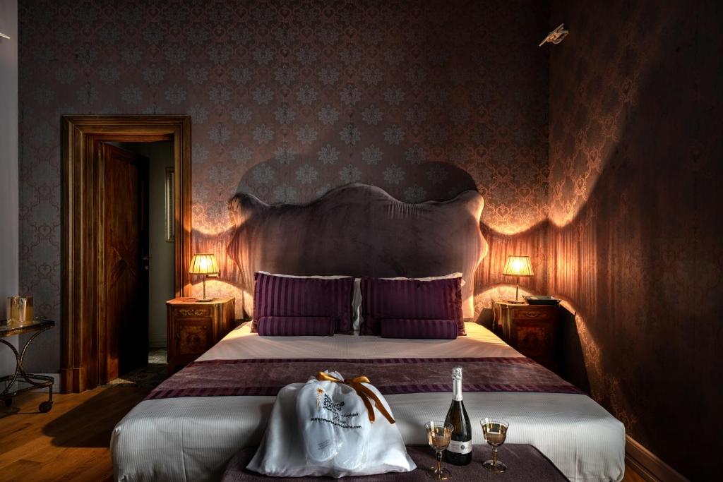 Posteľ alebo postele v izbe v ubytovaní Navona Grand Suite
