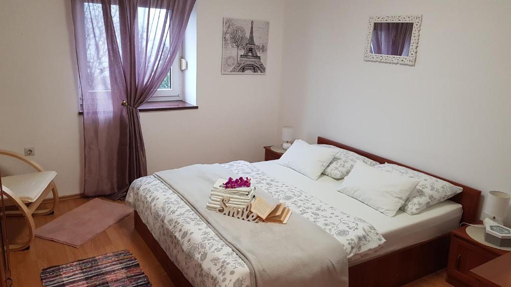 Postel nebo postele na pokoji v ubytování Apartman Ivan