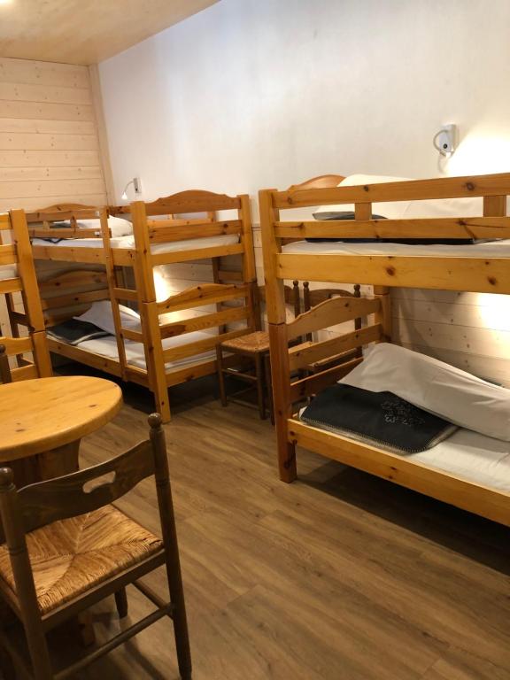 Postel nebo postele na pokoji v ubytování Alpenrose Chamonix