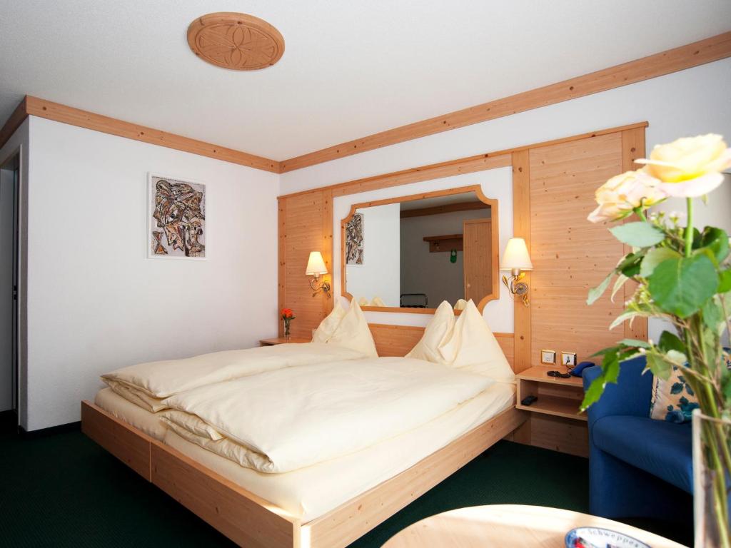 Postel nebo postele na pokoji v ubytování Hotel Ambiente