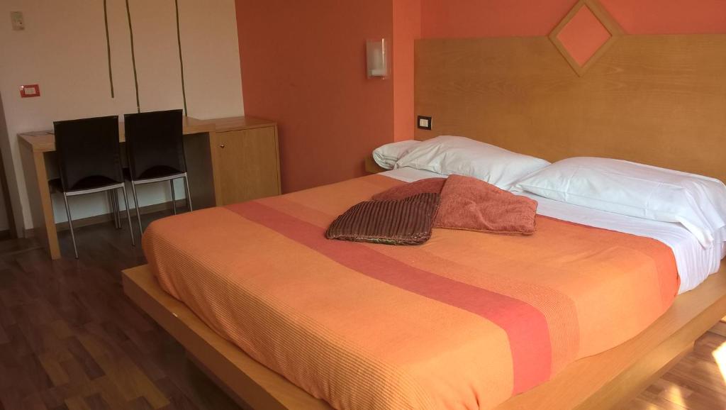 Postel nebo postele na pokoji v ubytování Bellaria Relais